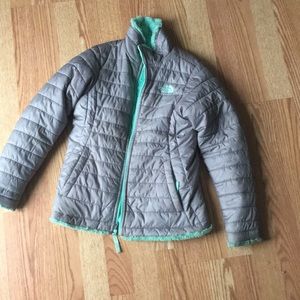 reversible grey and mint north face jacket